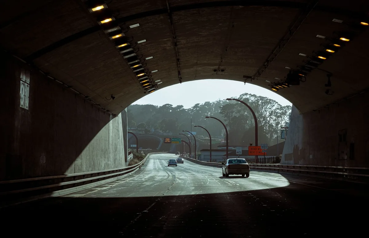driving into bright tunnel